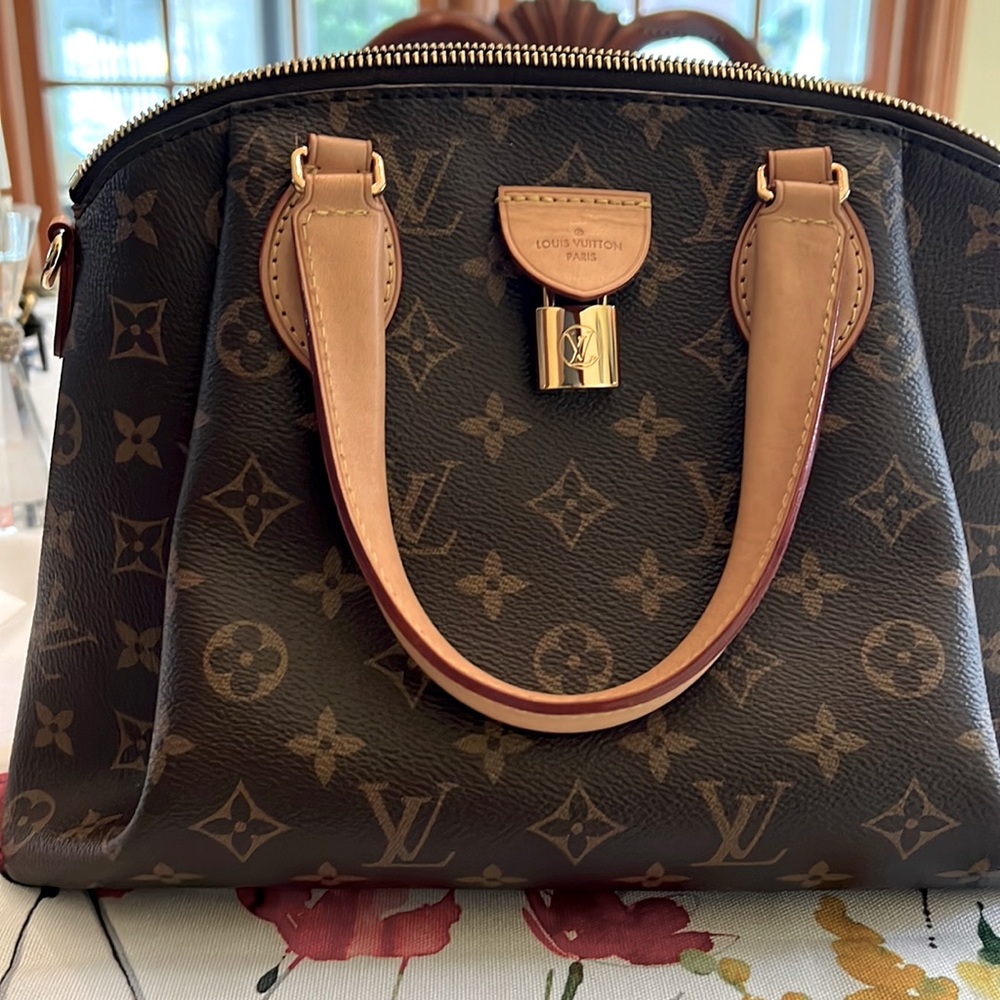 Louis Vuitton Rivoli hand bag only used a few.